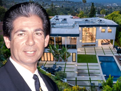 Robert Kardashian With His Home